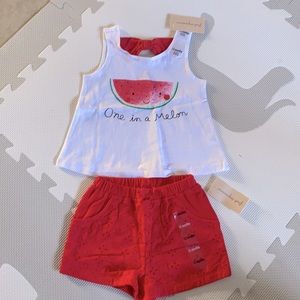 Baby One in a melon matching tank and short set